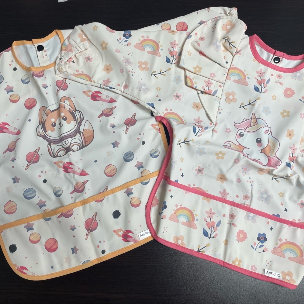 Unicorn and space bundle bibs
